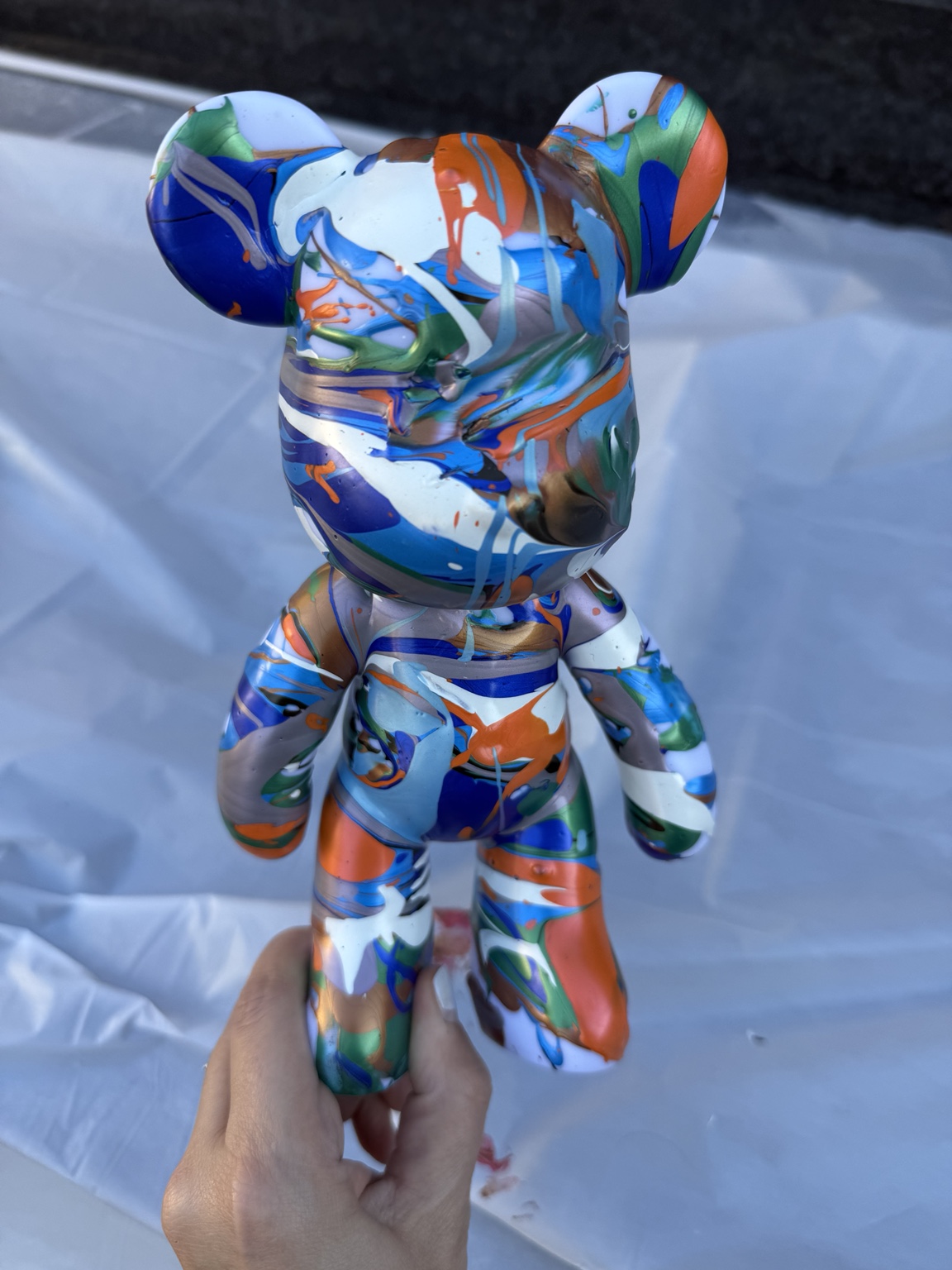 Orange and blue bear